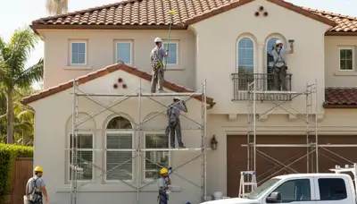 Painter in Anaheim, CA applying interior paint for a professional residential painting service